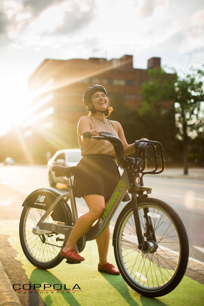 Coppola Photography Boston Bike Image Woman Smiling Sunlight Green Lane Hubway