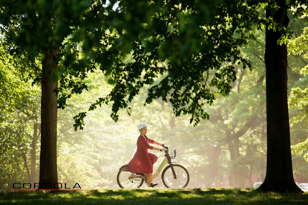 Coppola Photography Boston Bike Image Women in Red Dress Trees Sunlight