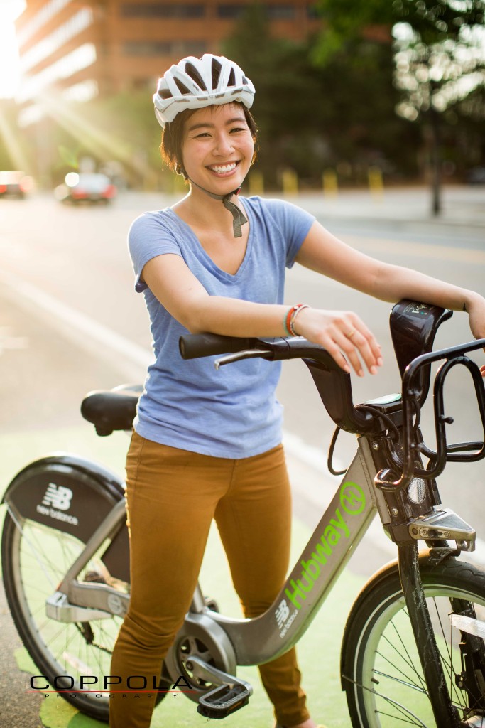 Coppola Photography Boston Bike Photo Asian Woman Smiling Sunlight Green Lane Hubway